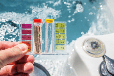 Checking water quality with a chemical test kit