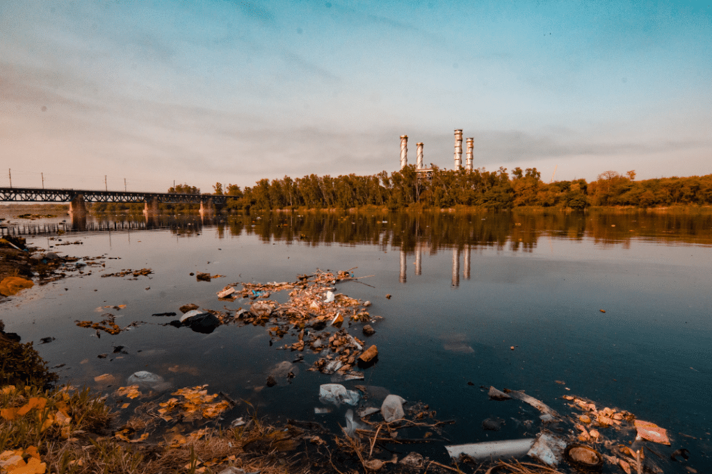 Erosion of surface waters by industrial waste as a hidden source of groundwater pollution